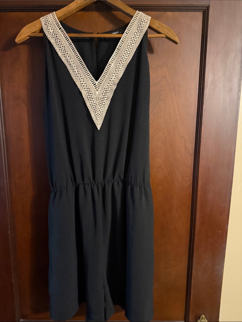 Women’s Black Romper with Crochet V-Neck